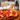 Artisan pepperoni pizza with bubbling mozzarella and crispy pepperoni, paired with two glasses of Italian prosecco for a perfect date night meal kit.