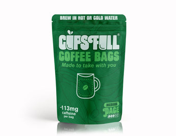 Green coffee bags packaging with 'Gulf's Full' branding on a white background