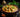 Bowl of creamy chicken curry with garnishes on a wooden table