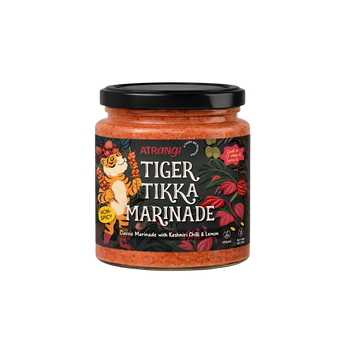Jar of Tiger Tikka Marinade with a colorful label on a white background