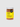Jar of wild rice snacks with a yellow label on a white background