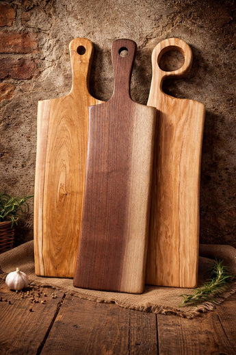 Long handmade wooden charcuterie paddle board