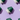 Green and white ceramic cups arranged in a pattern on a purple background