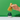 Hand holding a bamboo whisk above a white and green container on a green background