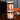 Two jars of Lahore Tamarind Chutney on a wooden surface with a colorful label.