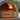 Delivita pizza oven with flames inside, outdoor setting