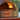Delivita pizza oven with flames inside, outdoor setting