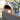 Delivita outdoor pizza oven on a stand with a blurred natural background