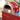 Red Delivita pizza oven on a stand outdoors
