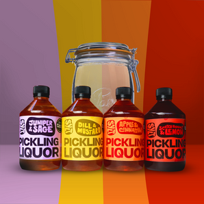 Pickling Starter Pack Gift Set with four liquor bottles and glass jar.