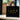 Black tote bag with 'JARA 100% Wild Honey' text on a blurred background