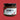 Jar of Chimmy's Chimichurri on a red background