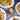 Plates of food with a jar of La Habra Tamalero Chutney on a metal surface