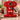 Red illy X1 Anniversary espresso machine in a kitchen breakfast setting