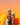 Three cans of 'Irish Hibiscus' sparkling juice with a mango and flower on an orange background