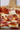 Close-up of a pizza with tomato and cheese toppings