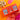 Spice Kitchen Chilli Collection packaging on an orange background with a pink tag and gold bow.