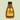 Bottle of Welsh Honey Butter Sauce with a yellow label on a beige background