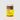 Jar of wild rice snacks with a yellow label on a white background