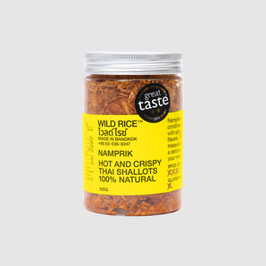 Jar of wild rice snacks with a yellow label on a white background