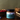 Jar of Barté Rum Salted Caramel on a wooden surface with blurred background