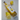 Bottle of RamTang lemon liqueur with lemons on a white background