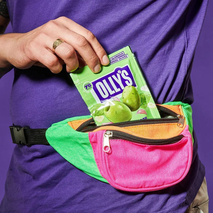 Olly's garlic and basil green olives pouch being pulled our of a small bag